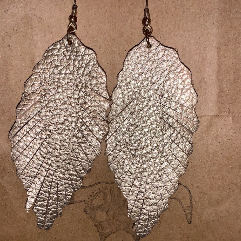 Gold feather earrings
